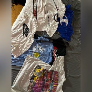 Bunch of random nice T-shirts. sizes range from S-M. varied prices